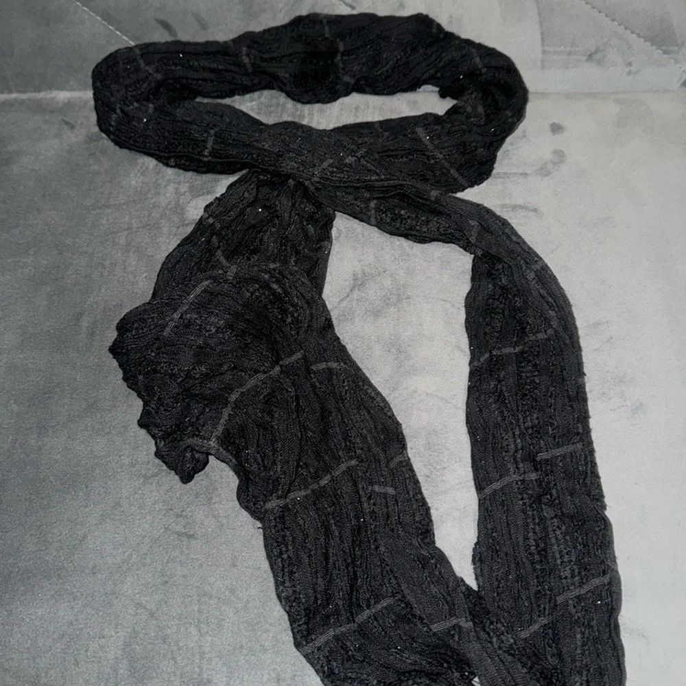 Black with foil inlay fashion scarf. NWOT